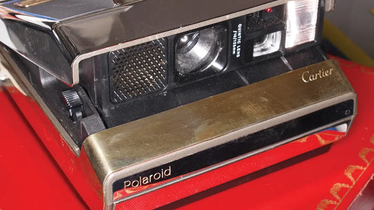 The History of Polaroid Gold­-Plated Instant Cameras