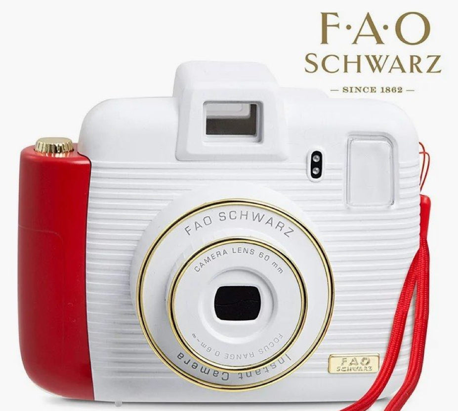 10-04 sharper image F.A.O SCHWARZ instant camera